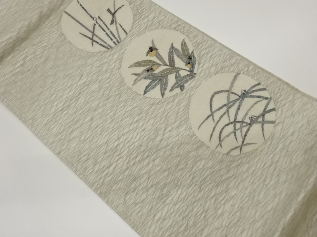 すくい織丸に虫・草葉模様織出し袋帯